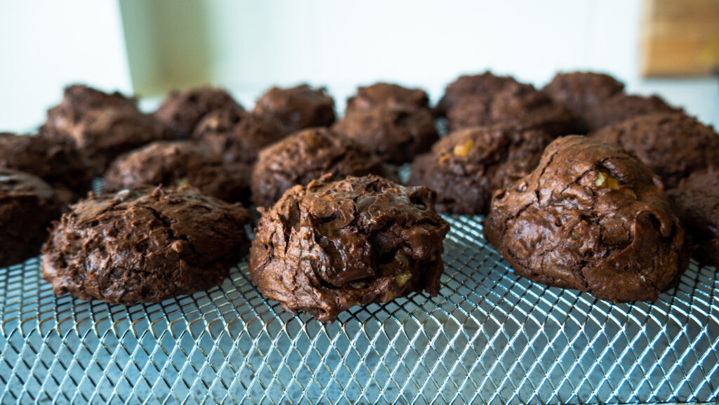 chocolate cookies cooling off on rack