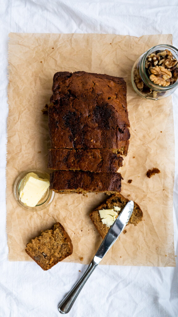 banana bread cut with butter from above