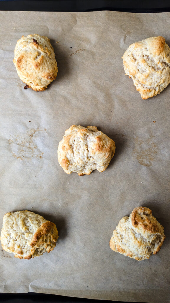 sourdough drop biscuits on a baking pan